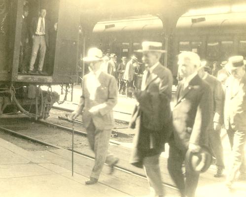 Samuel M. Wilson and other men leaving a railroad station (duplicate of # 596)