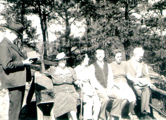 Left to right: Samuel M. Wilson, Mrs. E.L. McDonald, Sarah Carter, unidentified man and woman, and E.L. McDonald