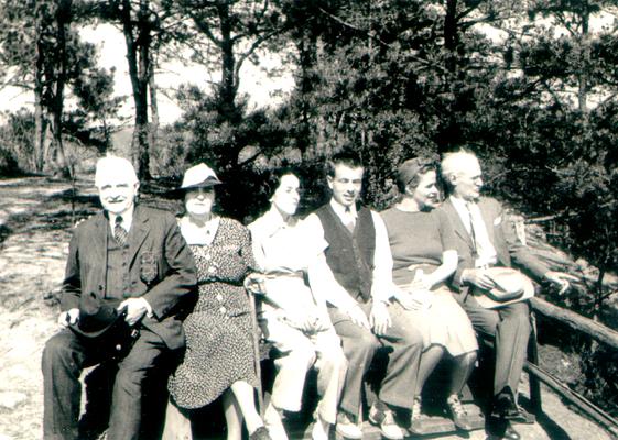 Left to right: Samuel M. Wilson, Mrs. E.L. McDonald, Sarah Carter, unidentified man and woman, and E.L. McDonald