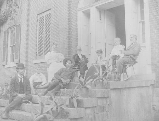 Shelby House; eight people on the steps