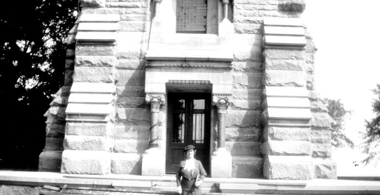 Mary Shelby Wilson in front of a building