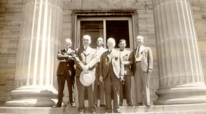 Samuel M. Wilson and five men on the steps of a building