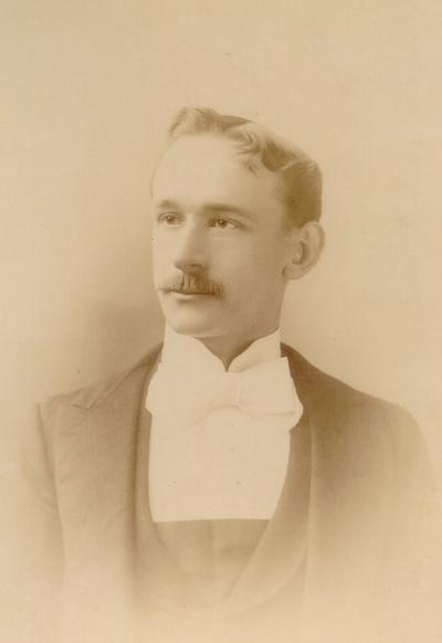 Portrait of a young man; Bachrach & Bro. L.E. cor. Lexington and Euton Sts. Baltimore, MD