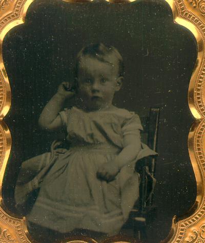 Child, female, c. 1856-1900; hand colored and cased; also a tintype of a young boy, inserted in the facing cushion of the case; both listed and described in 19th Century Photographs, a catalogue from UK Special Collections