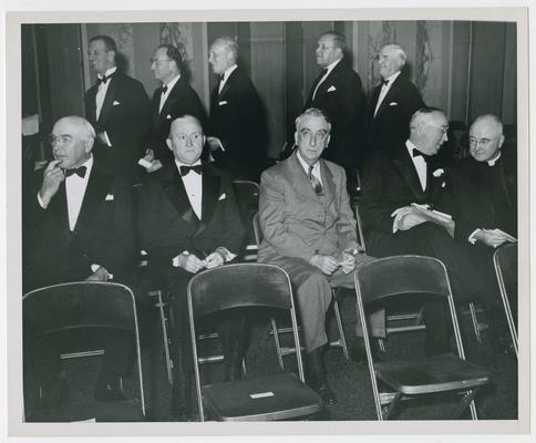 Secretary Vinson seated with members of New York County War Bond Committee including Cardinal Spellman, Archbishop of New York