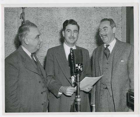 Secretary Vinson, left, with Lowell Thomas of NBC and Secretary of State Dean Acheson