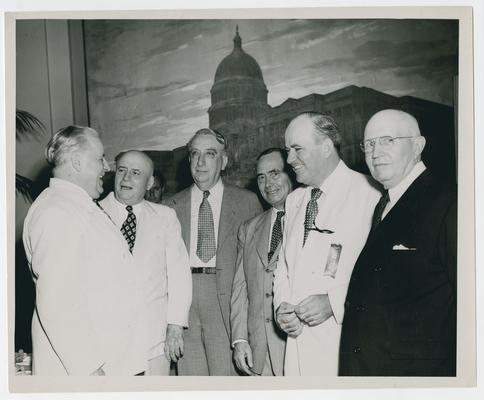 Secretary Vinson with Speaker of the House Sam Rayburn and others