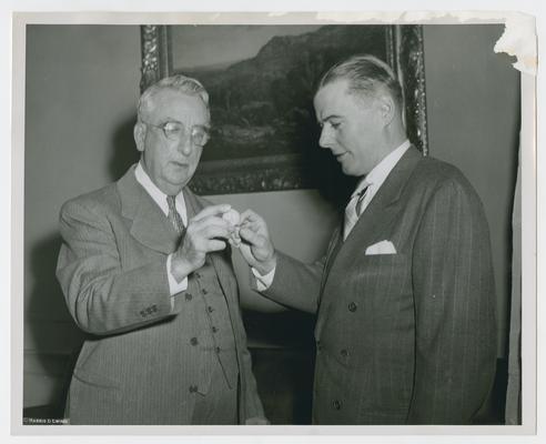 Vinson with Thomas Mead of Universal Newsreel