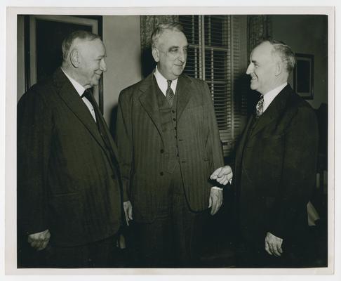 Secretary Vinson with Josephus Daniels and Frank Graham, right, president of University of North Carolina