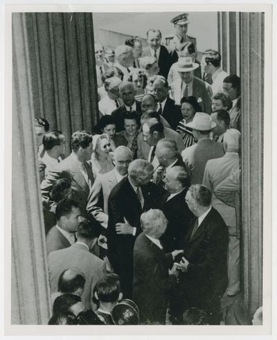 Secretary Vinson with Harry D. White in receiving line at Savannah Conference, from overhead