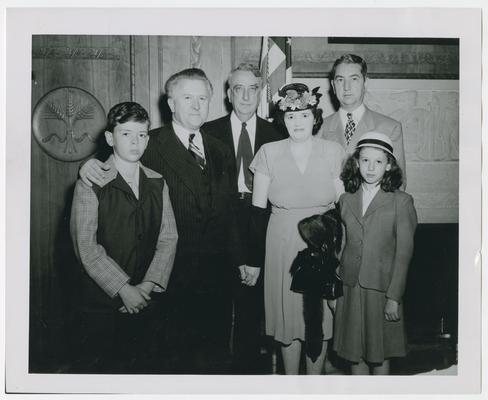 Judge John W. Murphy and family with Chief Justice Vinson, center, and Justice Clark, right rear