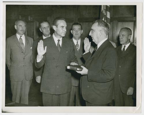 Chief Justice Vinson swears in W. Averell Harriman as Secretary of the Commerce. Left to right: Secretary Acheson, Secretary Anderson, Secretary Hannegan, and Secretary Patterson