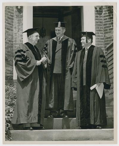Chief Justice Vinson, left, with two men, after receiving honorary degree at Washington and Lee University