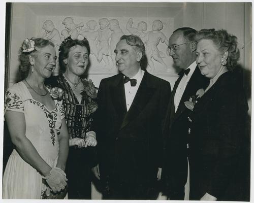 Secretary Vinson, center, with unidentified man and three women at Savannah Conference