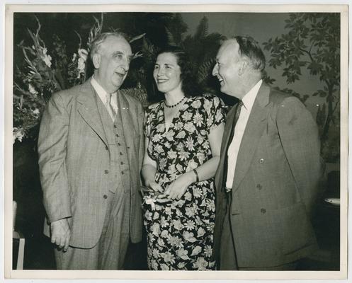 Chief Justice Vinson, left, with Helen Sioussat and Justice Black