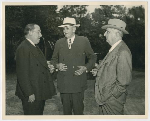 Chief Justice Vinson, right, with Basil O'Conner and Homer Cummings