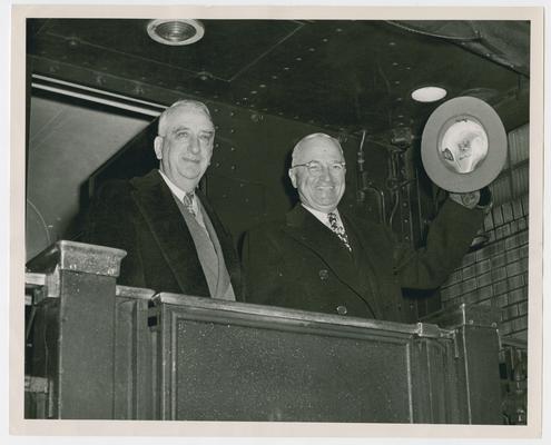 Chief Justice Vinson and President Truman on railroad car on the way to the Army-Navy Game at Philadelphia