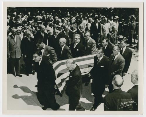 Pallbearers carry flag-draped casket at funeral for Justice Frank Murphy
