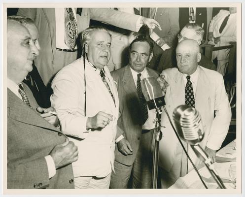 Dinner with Representative Boykin. Left to right: Vinson, Speaker Sam Rayburn, and others