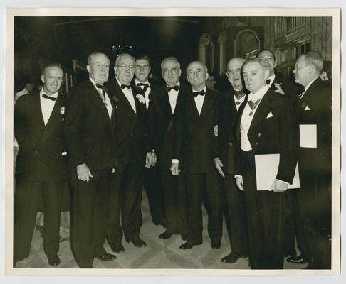 Guests at Friendly Sons of Saint Patrick Dinner. Left to right: Unidentified man, John Russell Young, Doctor Edward P. Thomas, Edgar Morris, Chief Justice Vinson, James F. Byrnes, A.O. Stanley, Irish Ambassador Hearne, Arthur Phelan, and A.O. Stanley Jr