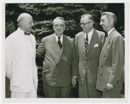 Page 4 of 13, Vinson with three unidentified men