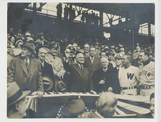 Opening baseball game at Griffith Stadium. Left to right: Alben Barkley, Vinson, General Vaughan, President Truman, Matthew Connelly, and Clark Griffith