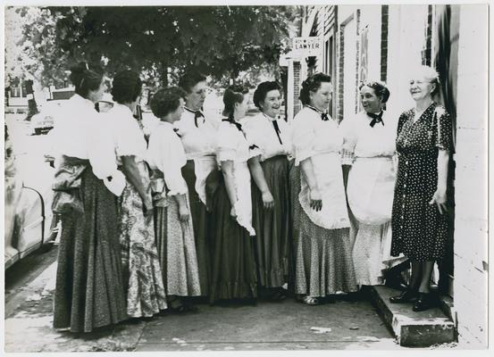 Fred M. Vinson with unidentified women