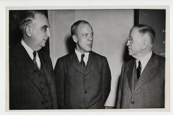 Vinson, left, with two men