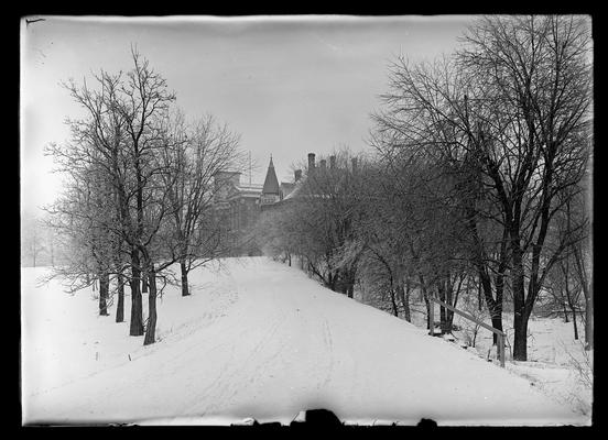 Winter scene looking north up drive, Health and Administration Building (Main Building)s in background