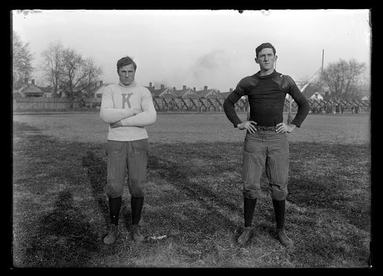 Football individiuals by twos, Big Johnson on left, Lengthy William C. Harrison on right