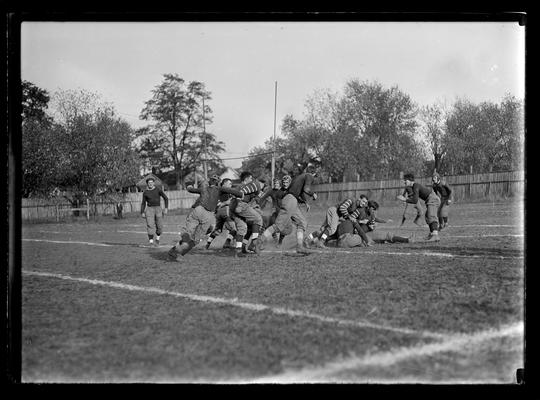 Football game at Lexington, University of Kentucky against University of Louisville, action at east end of field
