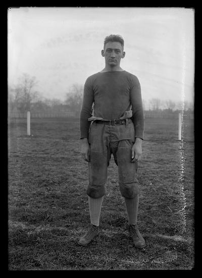 Football player on top of field, possibly Charles Schrader