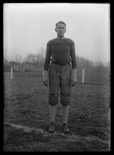 Football player on bottom of field