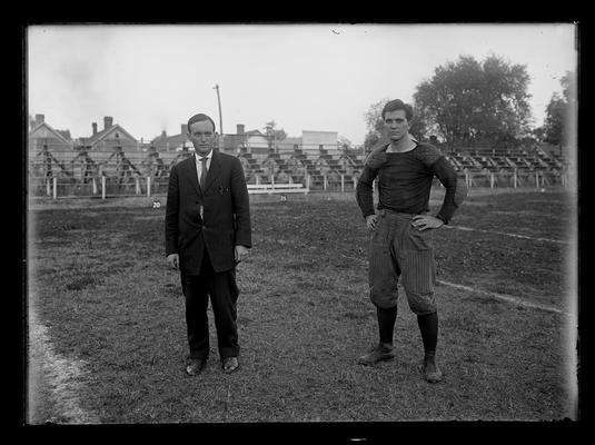 Young man in civilian clothes, football players, manager, captain