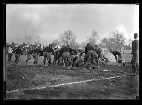 Football action, on right side of field toward campus, packs only