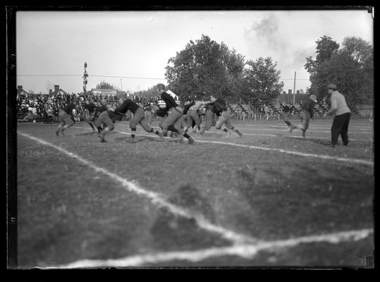 Football action, referee to right of picture