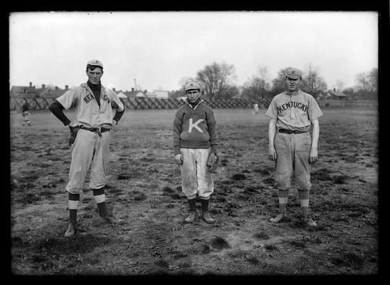 Three baseball players: South East Caudill, pitcher, Rooster Rochester, second base, Jersey Ellis, left field