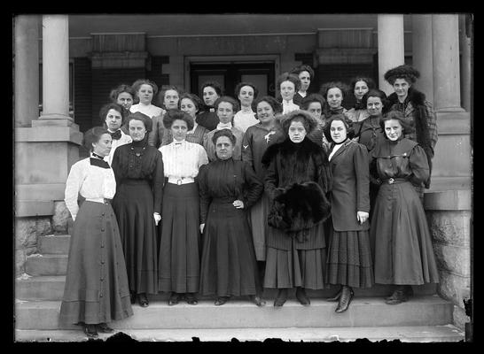 Young Women's Christian Association (YWCA) members on Patterson Hall steps, Katherine Schoene, president, Louise Colyer, secretary