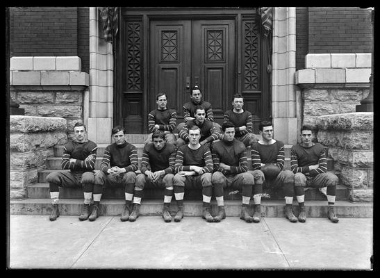 Football team on steps of Carnegie Library, 1912 team at end of season, Captain Harrison