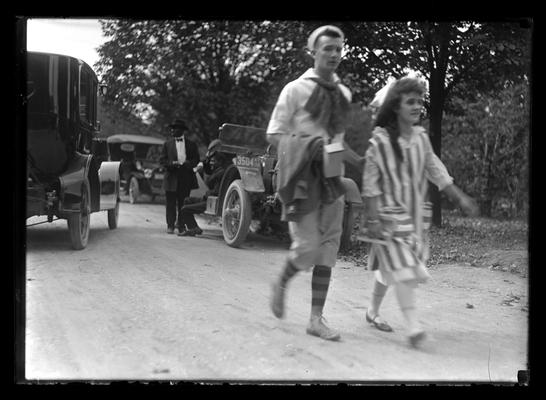 May Day Parade, boy in knee trousers, girl in broad stripes