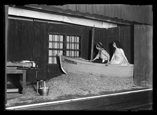 Scene from The Cat Boat, two women in boat