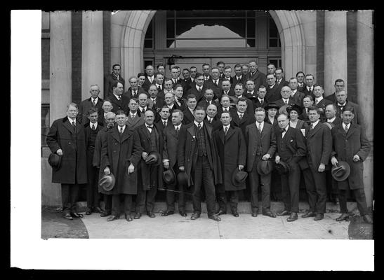 Short course in highway engineering, large group on steps of Pence Hall, all standing with hats on, President Barker to left