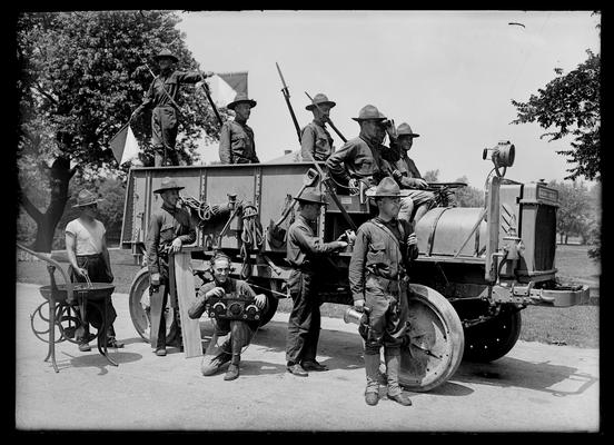 World War I field unit in communications, semaphore, radio, or wireless, several soldiers on truck