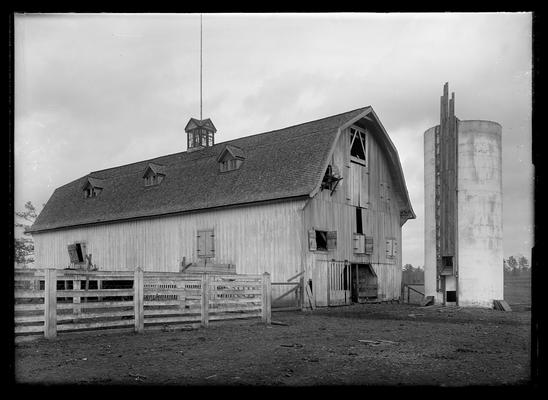 Barn with three dormers, concrete silos