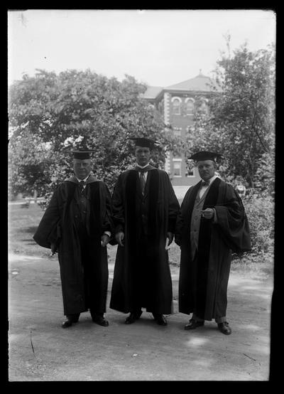 Three men in doctor's gowns, F. Paul Anderson to right, William Gibson, LLD of Pittsburgh, RC Stoll, LLD