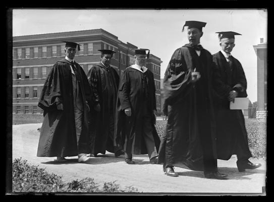 Procession, Dr F.L. McVey to left with speaker H.W. Wiley, Dr. William C. Bower, two others