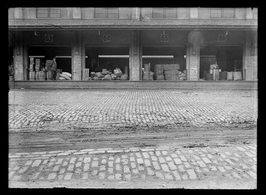 Vine Street Freight Depot, Commerce Street side, sections 63 through 66, man at 63