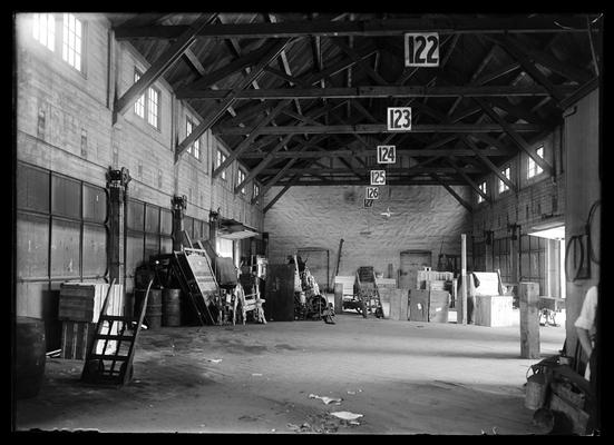 Interior of Freight Depot, overhead numbers 122 through 127