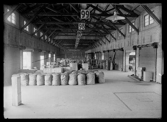 Interior of Freight Depot, overhead numbers from 99 and down