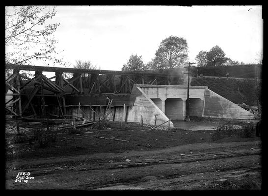 Bridge 126.9, east side, man on ladder and one on top to right